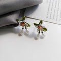 Sterling silver needle flower ear studs and flower ear clip pair alloy earrings set with camellia design