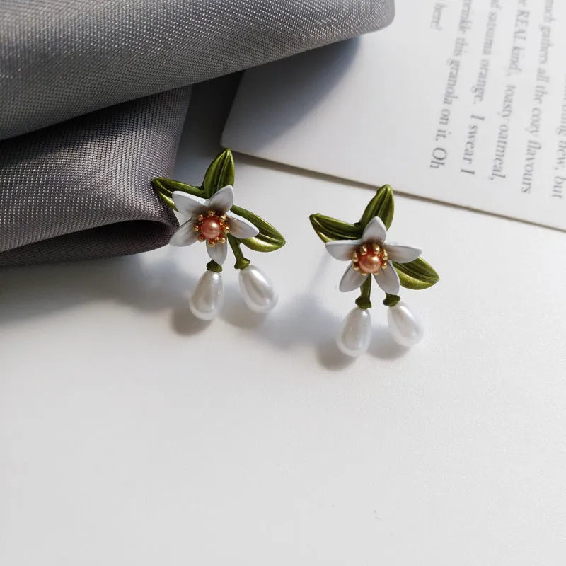 Sterling silver needle flower ear studs and flower ear clip pair alloy earrings set with camellia design