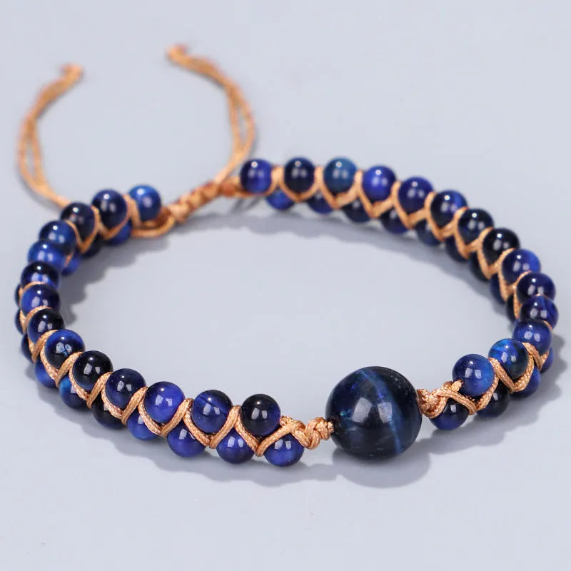 Handmade woven pull bracelet with geometric tigereye beads in blue or amethyst colour