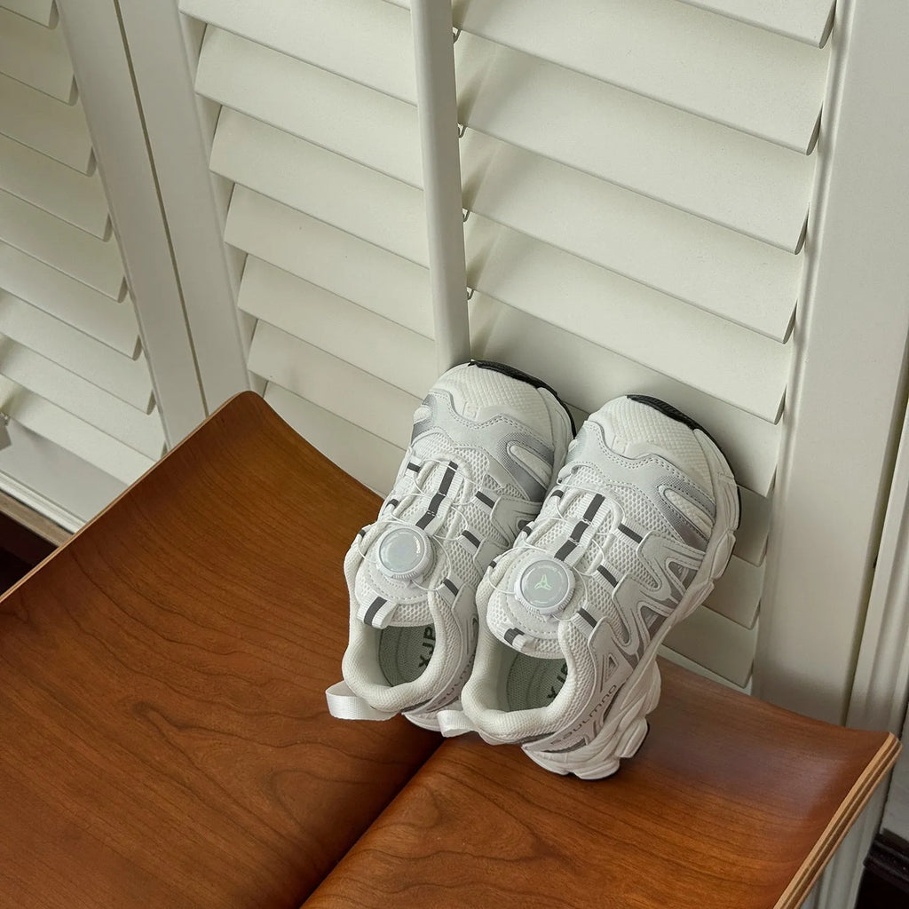 Lightweight beige casual shoes with a PU leather mesh upper and soft sole on a plain background.