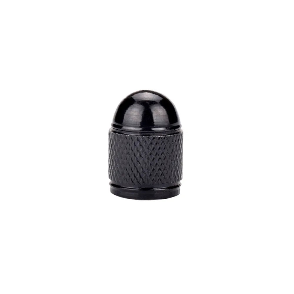 A single aluminium mountain bike tyre valve cap shown in a choice of five colours: black, blue, gold, red, and silver.