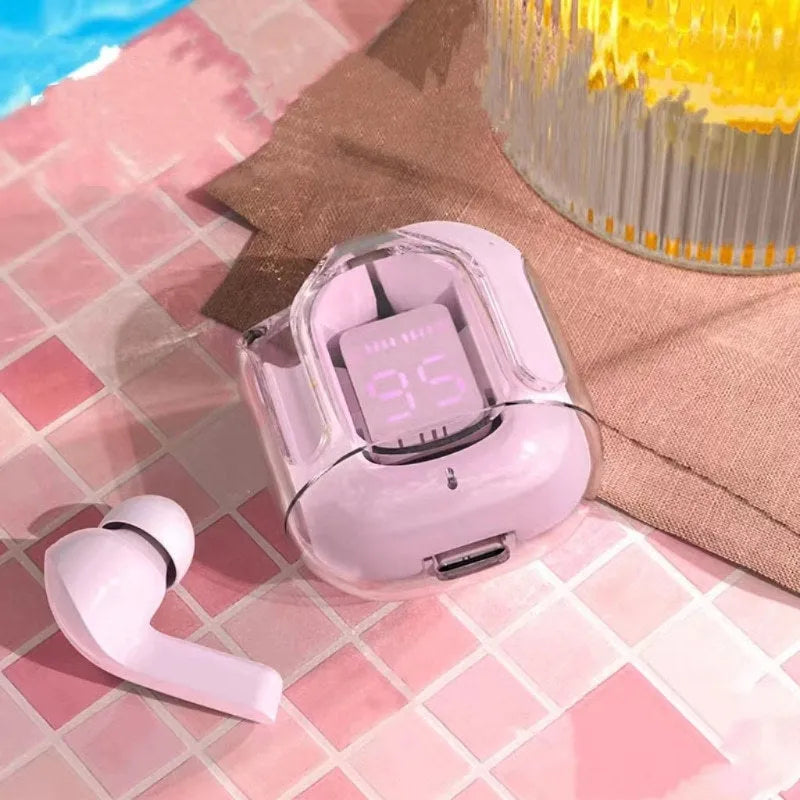 Transparent space capsule case containing true wireless Bluetooth earbuds with digital battery display