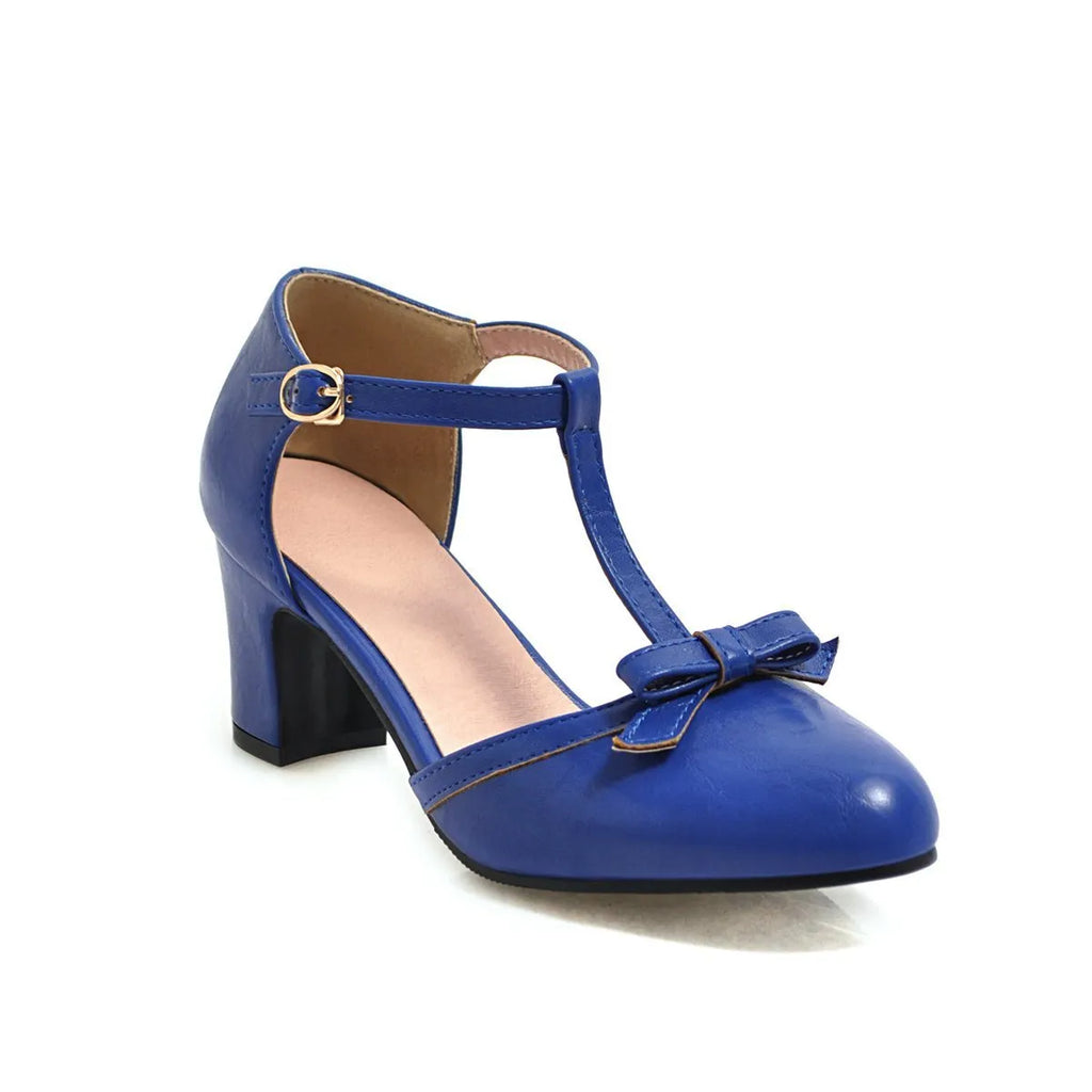 Women's apricot chunky heel sandals with buckle strap and bow detail on a hollow out PU upper.