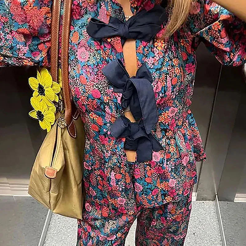 Women's floral print trousers suit set with puff sleeve top and matching trousers