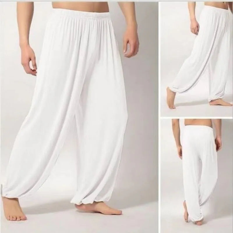 Black children's high-elasticity Sanda practice pants made from Lycra fabric, laid flat.