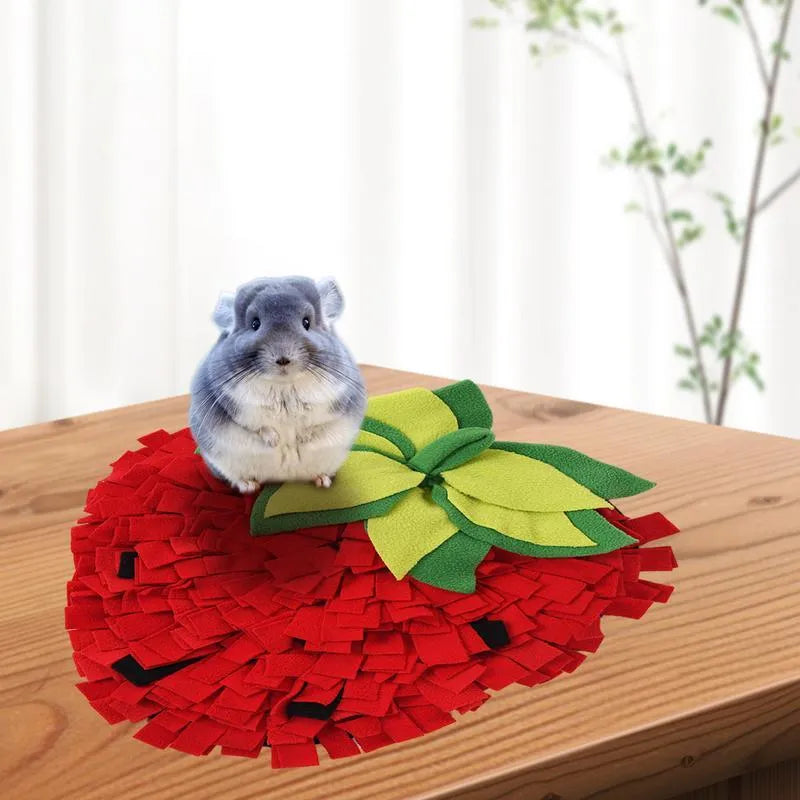 Red and green strawberry-shaped pet foraging mat for dogs and cats with multiple hiding spots