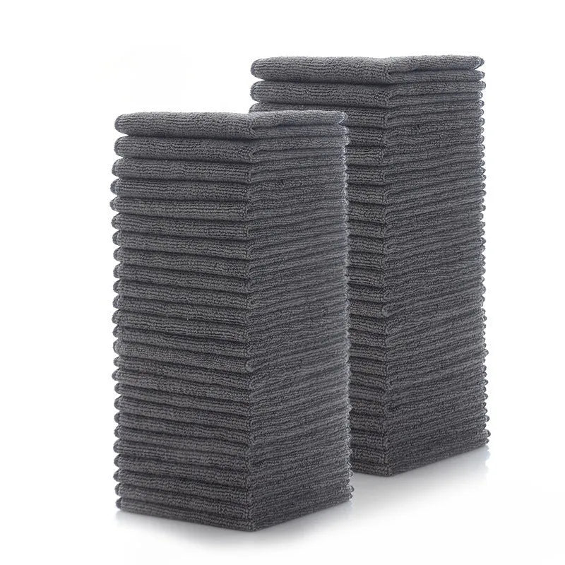 Grey square microfiber kitchen cleaning cloth for oil and grease removal on pots