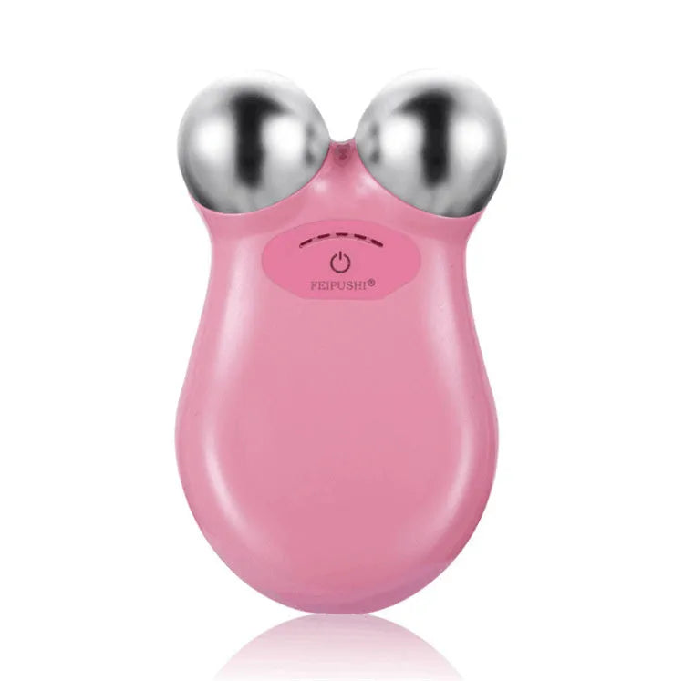 Pink and white micro current facial lifting device measuring 106mm x 65mm x 38mm