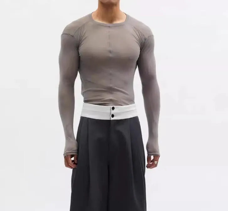 Black mesh slim-fit long sleeve PU pullover top with round neck on a model