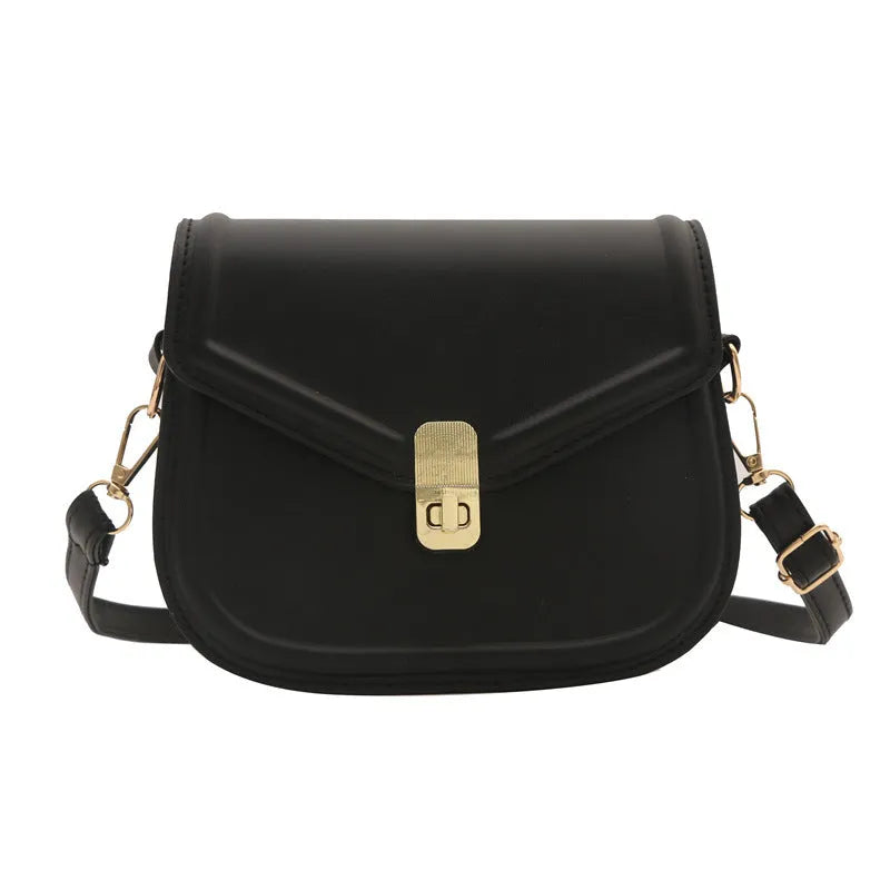 Soft PU leather messenger bag in clam shell design, shown in a horizontal square shape with a shoulder strap.