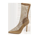Gold women's pointed toe stiletto high heel sandals with mesh upper and oversleeves.