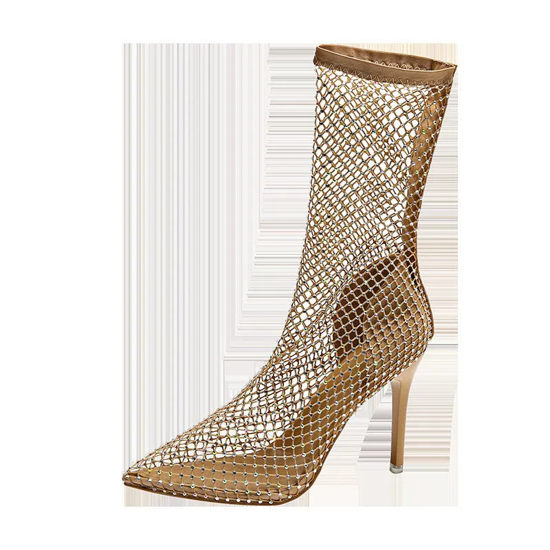 Gold women's pointed toe stiletto high heel sandals with mesh upper and oversleeves.