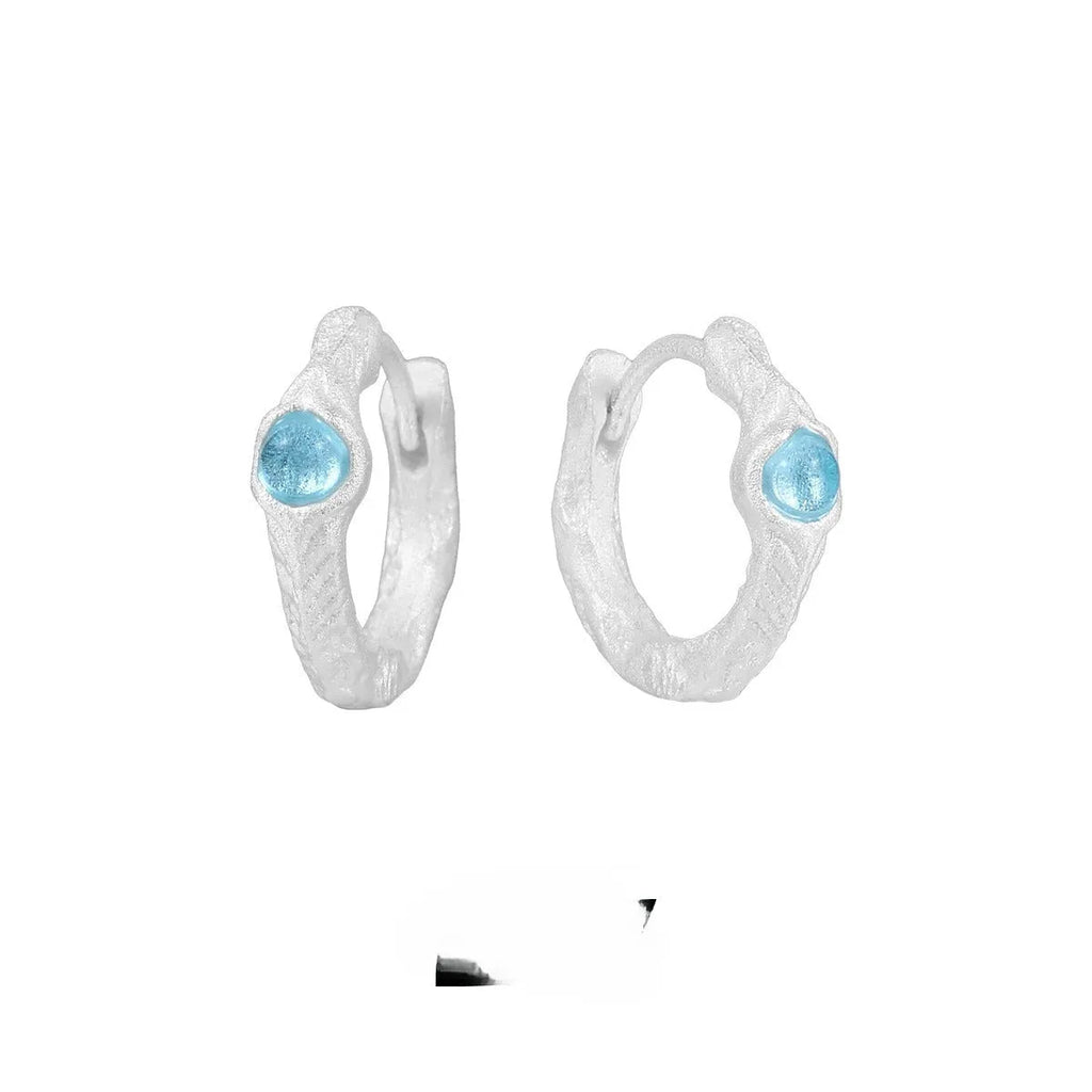 Geometric burnt silver women's ear clip made from 925 silver with circular design elements