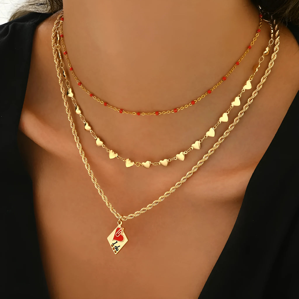 Silver adjustable three-layer clavicle chain necklace with a geometric love pendant.