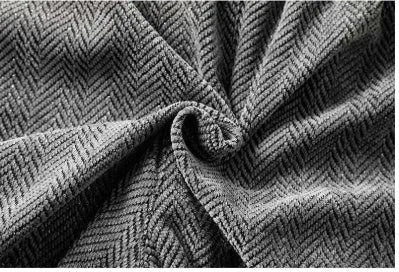 Light gray fleece-lined straight-leg trousers with a hollow-out design on a hanger.