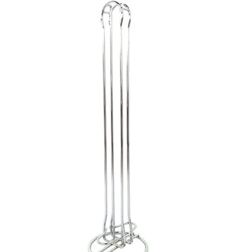 Wrought iron coffee capsule storage rack holding pods, in spray black finish.