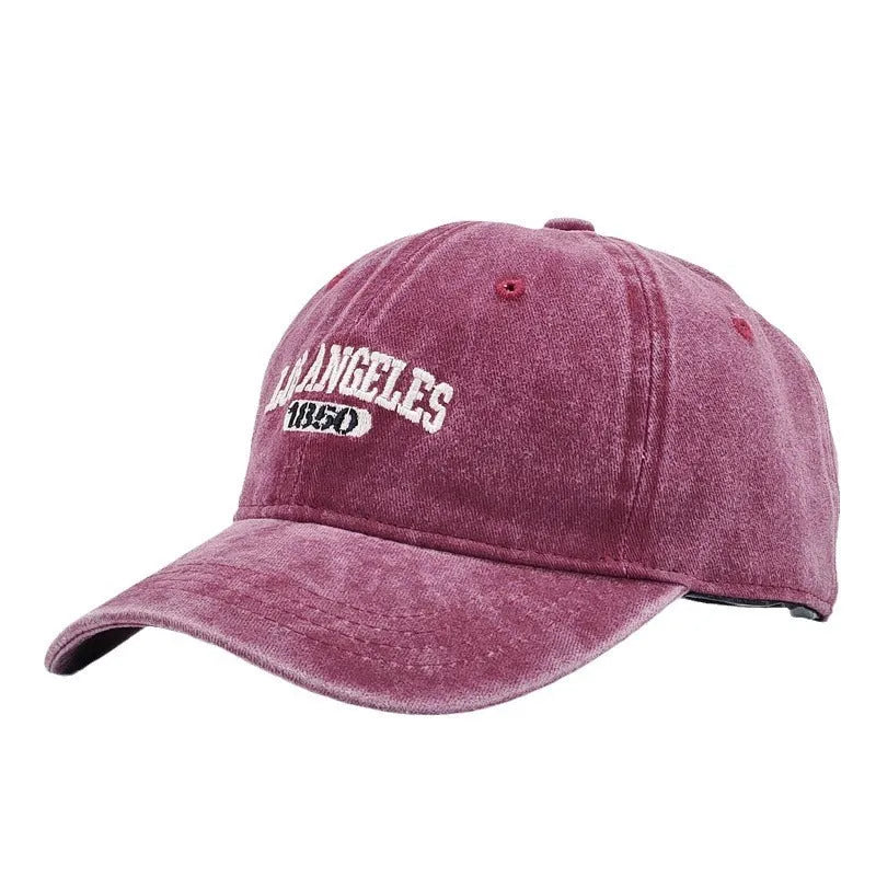 Personalised adult peaked cap with distressed letters embroidery in adjustable sizing