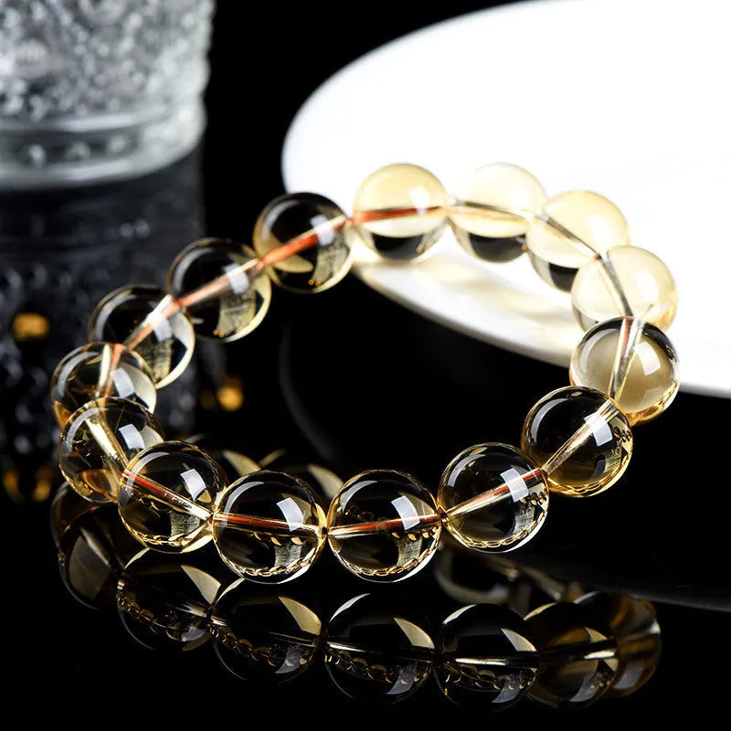 Natural citrine ball bracelet with scattered beads design in gold-brown colour
