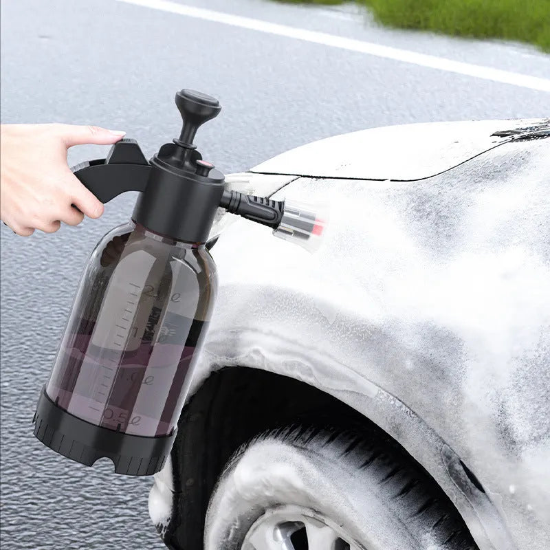 Black hand-held 2L foam sprayer watering can with nozzle, for garden and car washing.