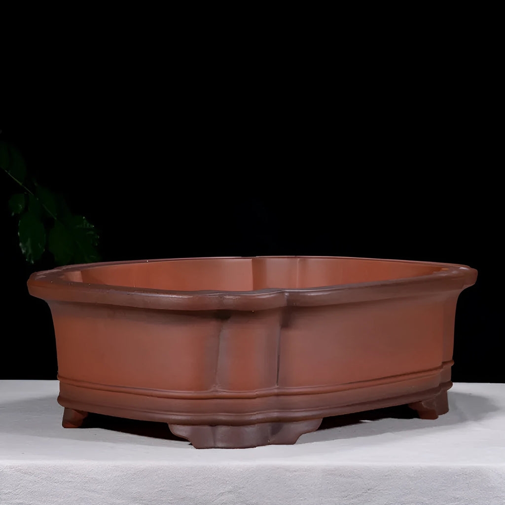 Large rectangular purple clay flowerpot with antique jade finish and Chinese crabapple carvings