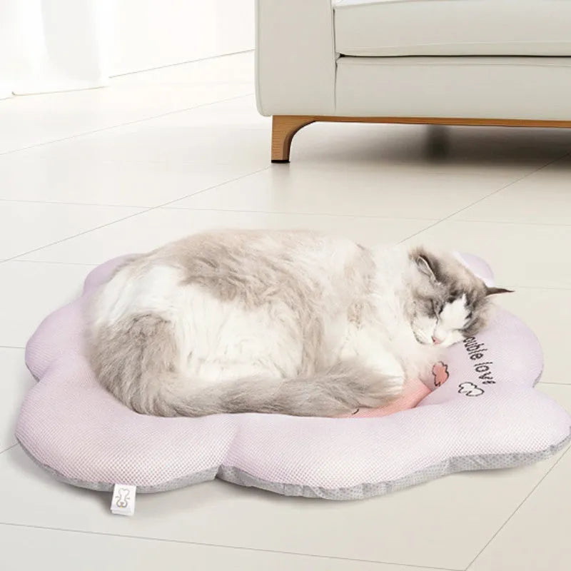Green and pink pet cooling mats showing four size options for dogs and cats