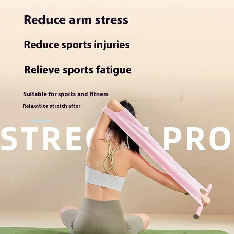 Grey and pink multi-function yoga stretching tool for shoulder, back, and hip flexibility exercises.