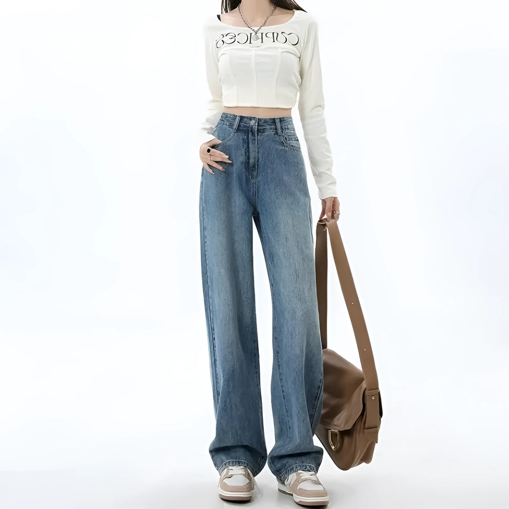 Women's retro blue wide leg jeans with high waist and straight leg silhouette on hanger