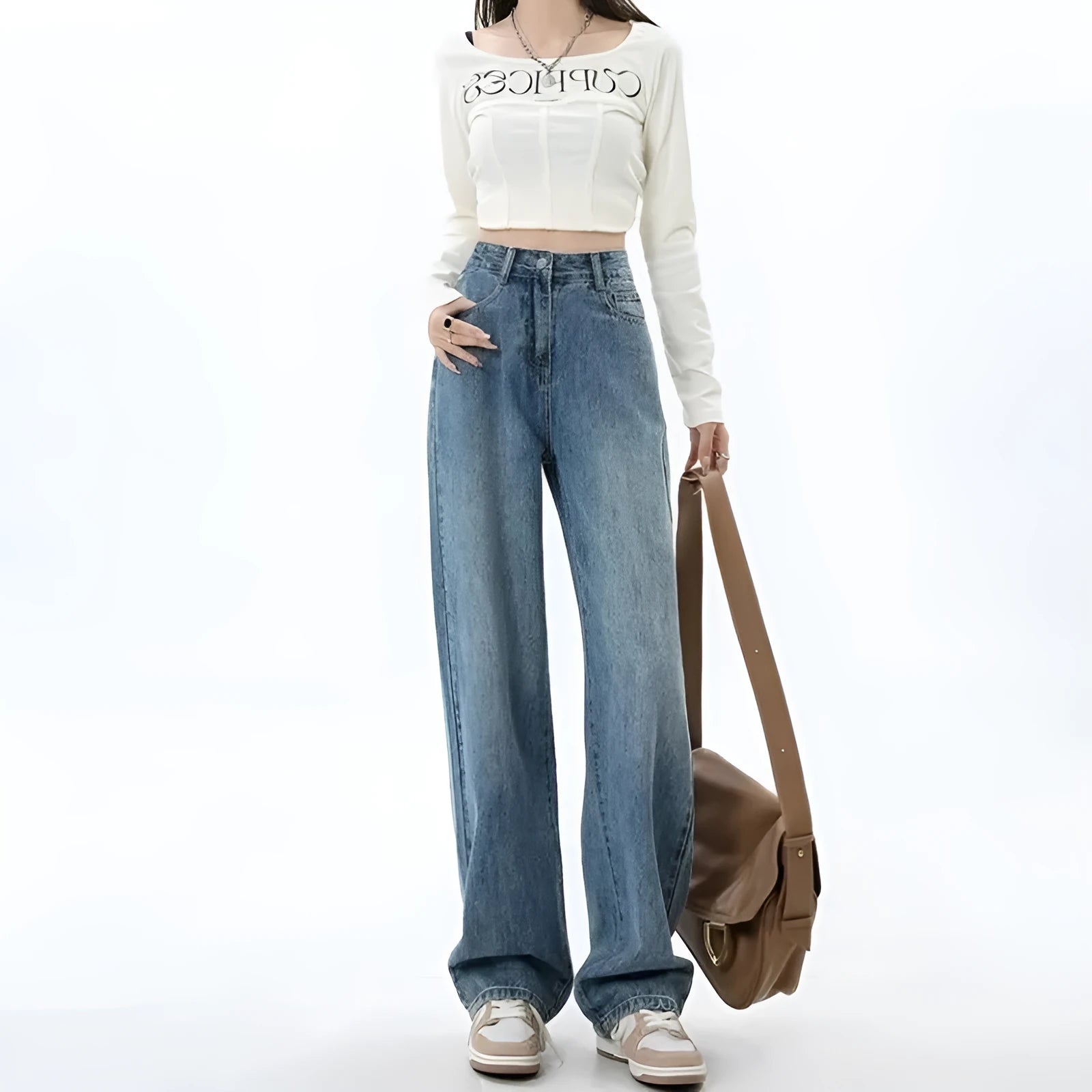 Women's retro blue wide leg jeans with high waist and straight leg silhouette on hanger