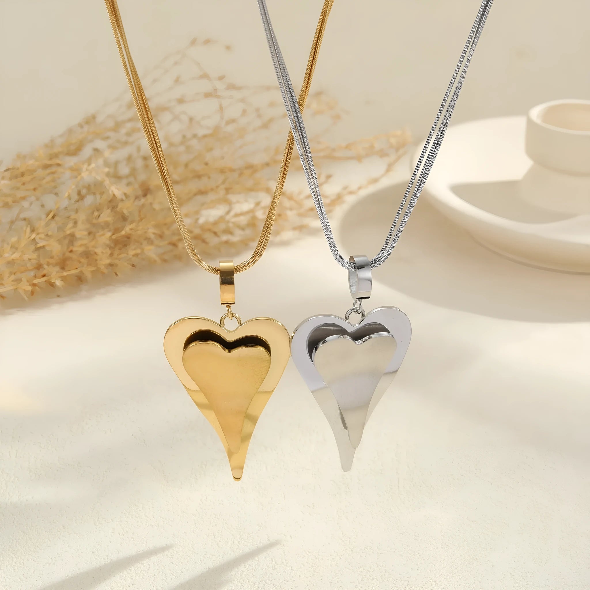 Double heart snake bones chain stainless steel necklace with geometric design in gold or steel colour options