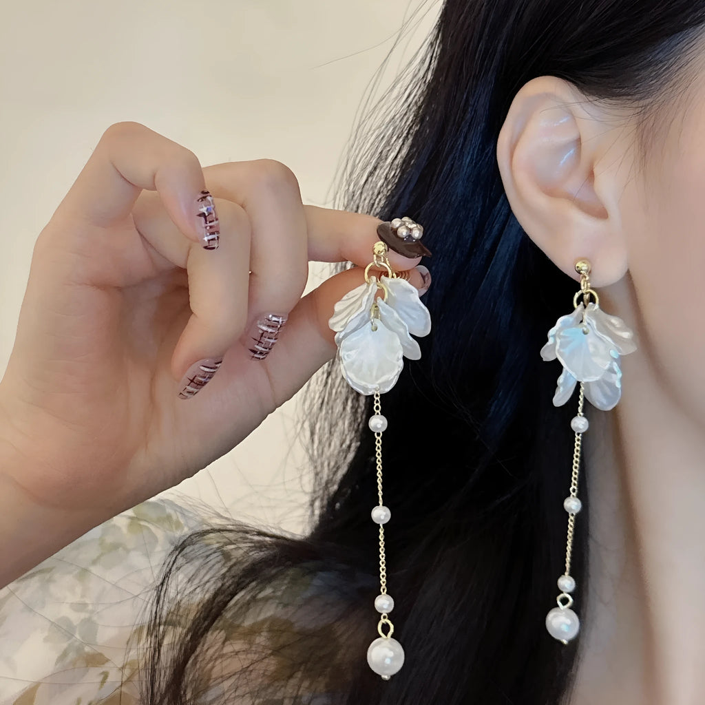Women's acrylic shell pearl tassel earrings showing 8.8cm length and clip attachment options