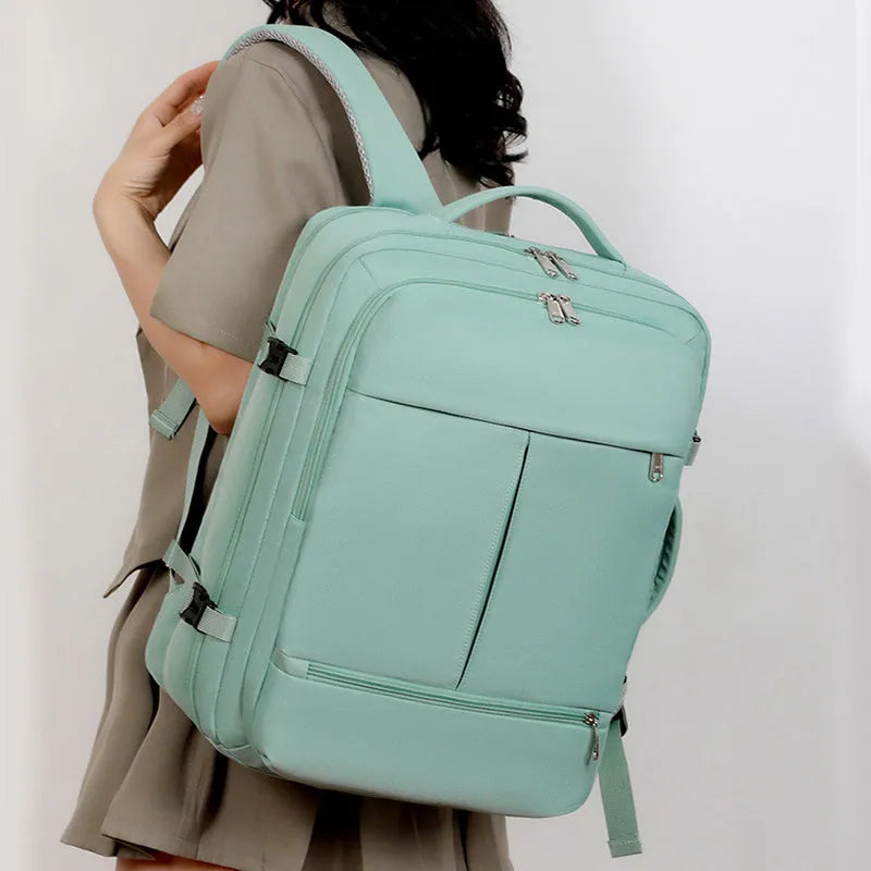 Waterproof Oxford cloth business backpack showing multiple pockets and zippers, suitable for a 15.6-inch laptop.
