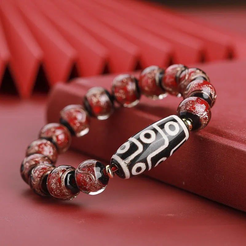 Handmade coloured glaze bracelet with auspicious patterns and year snake motif in Chinese style