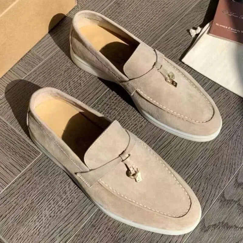 Gommino slip-on loafers with high-top design, round toe with steel head, and sewing line detail on artificial PU upper