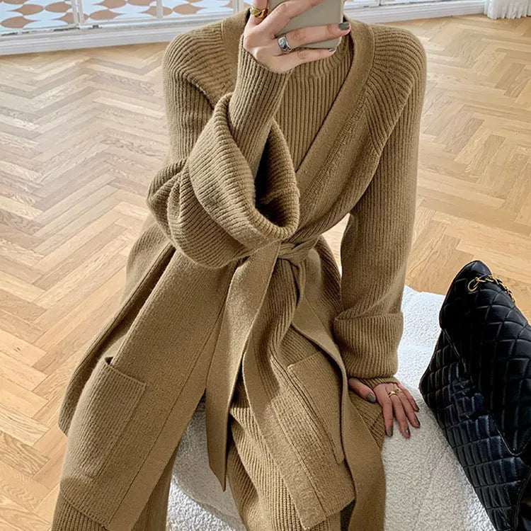 Women's apricot knitted wide-leg pants, sweater and cardigan three-piece set with leather stitching detail.