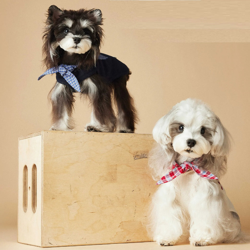 Sailor collar sleeveless dog vest in beige polyester, side view on a small breed dog