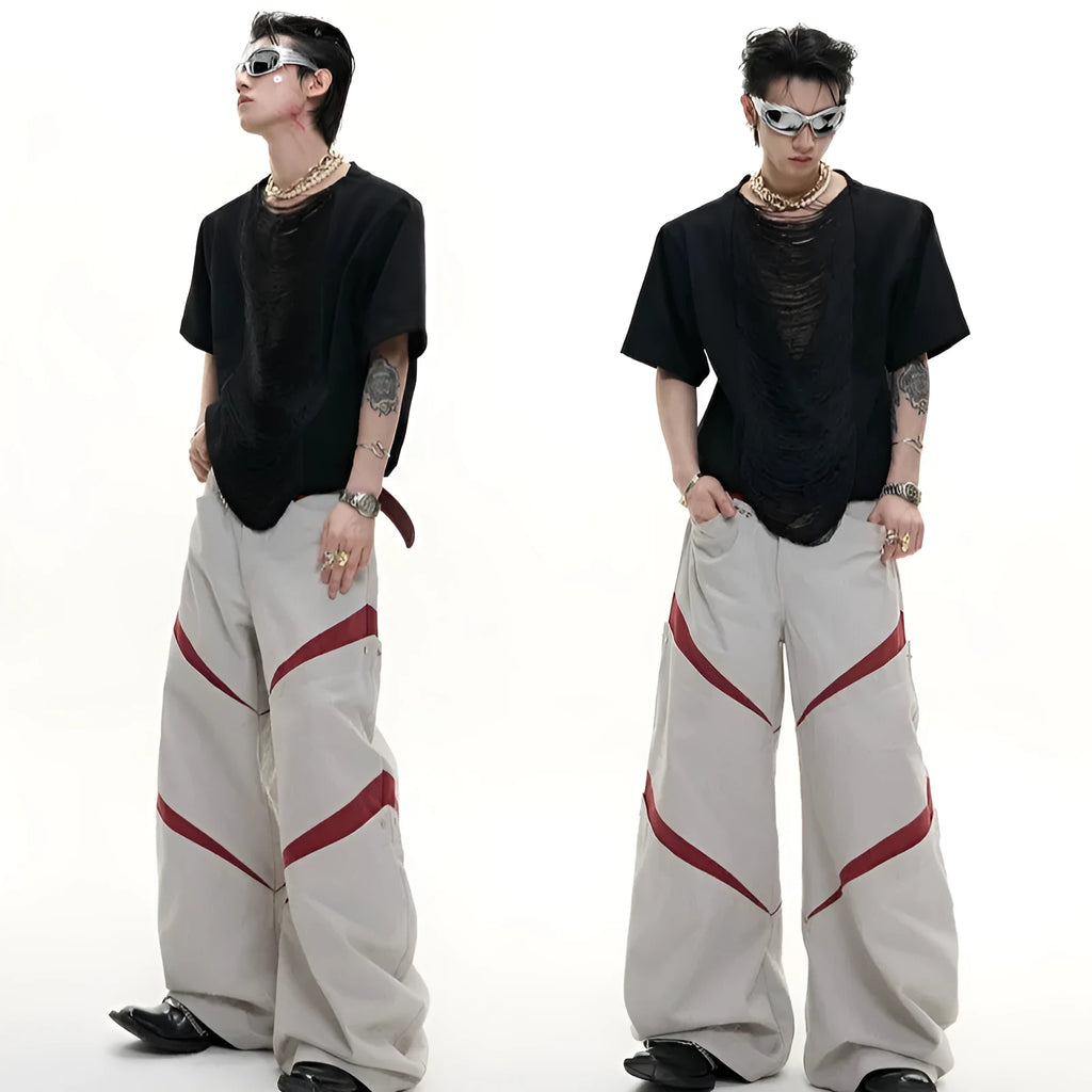 Drum black loose-fit men's V-neck short sleeve t-shirt with tassel detail on the collar.