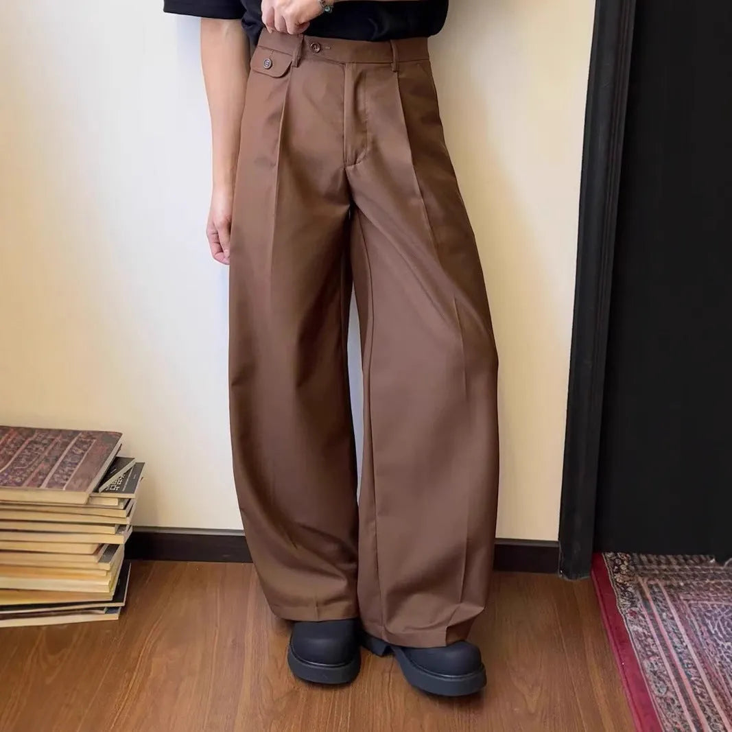 Men's brown straight-leg casual trousers with loose wide-leg design on hanger