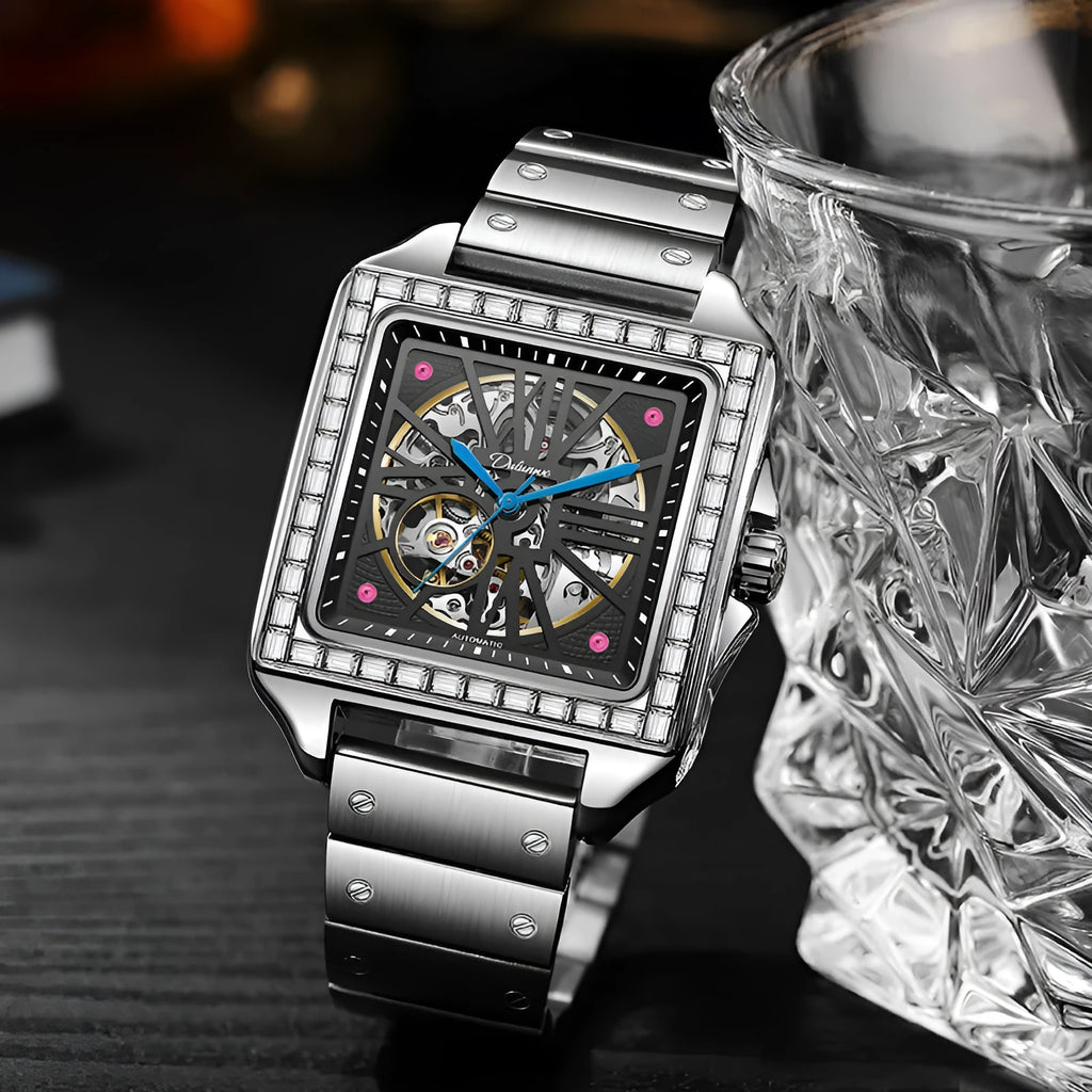 Men's square automatic watch with diamond-studded dial on a black leather strap.