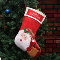Non-woven fabric Christmas stocking decorations in Elk, Old Man, and Snowman designs.