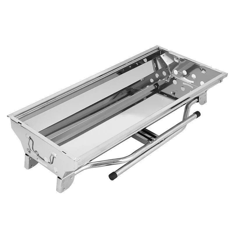 Stainless steel portable folding barbecue oven with grill, shown collapsed for storage
