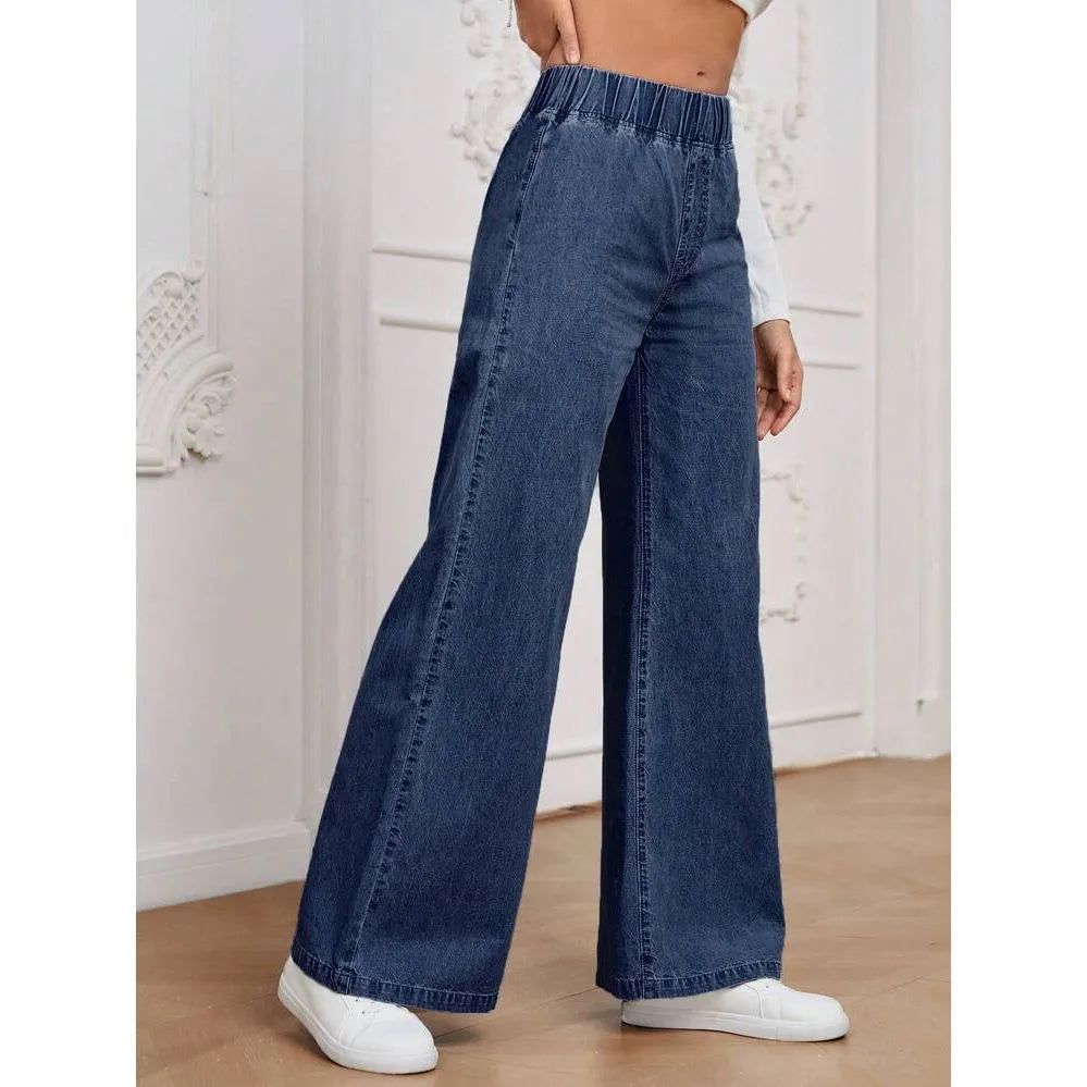 Light blue washed wide-leg straight jeans on a hanger, showing zip fly and mid-waist design.