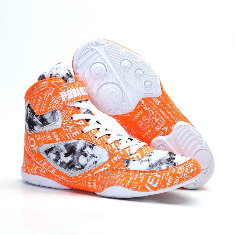 Men's high-top boxing shoes with graffiti style, black colour, front lace-up closure, mesh upper, and rubber outsole on a flat surface.