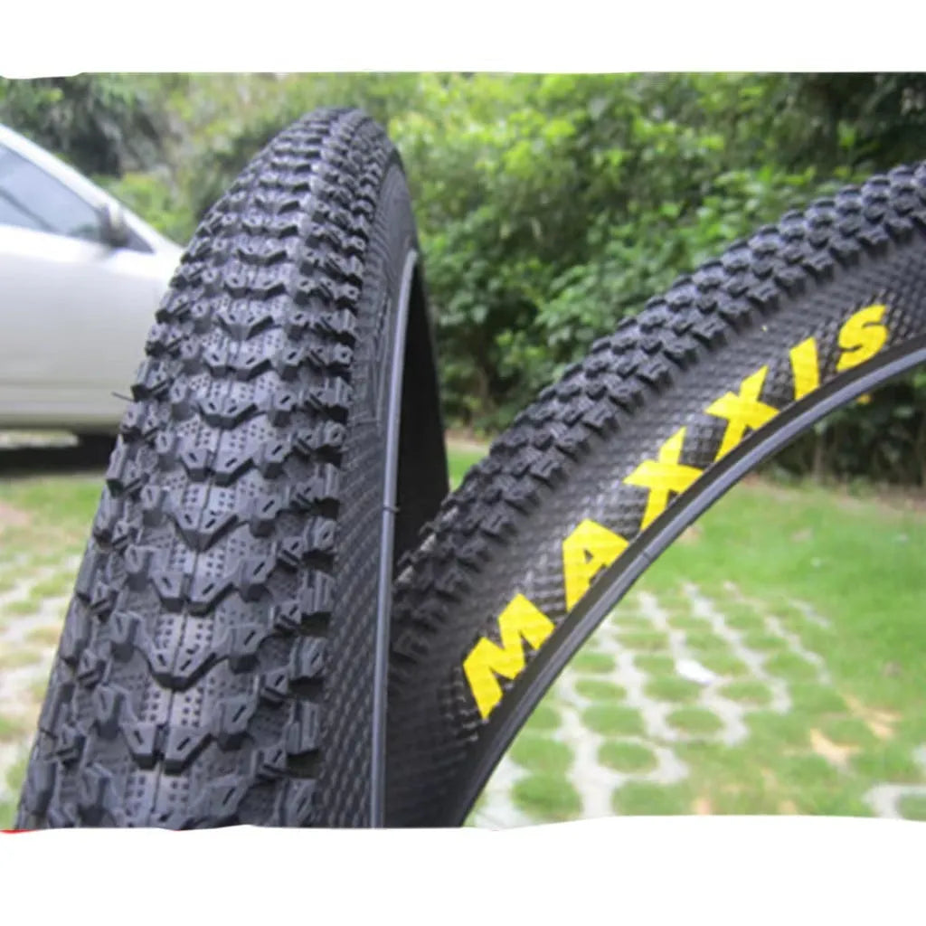 Ultralight puncture-resistant mountain bike tyre showing tread pattern, available in multiple wheel sizes.