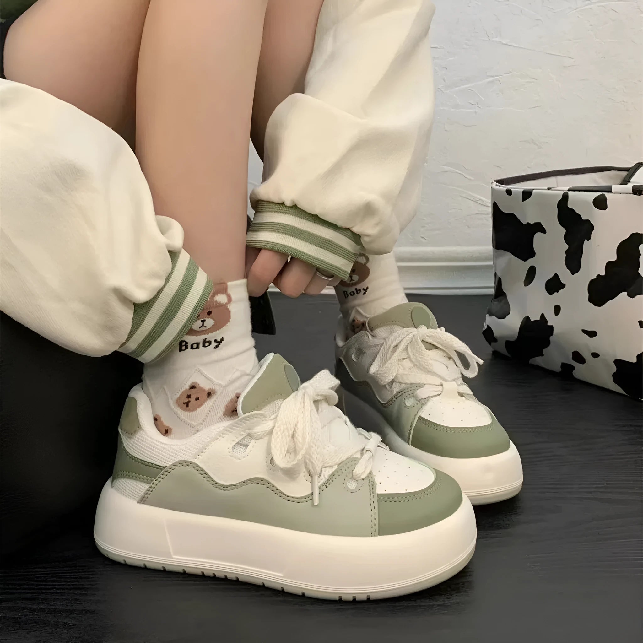 Green women's casual shoes with mesh upper and lining, flat heel and round toe design