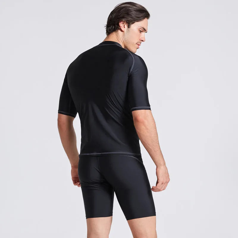 Men's blue quick-drying nylon swim set with half-sleeve top and matching swim pants on a mannequin.