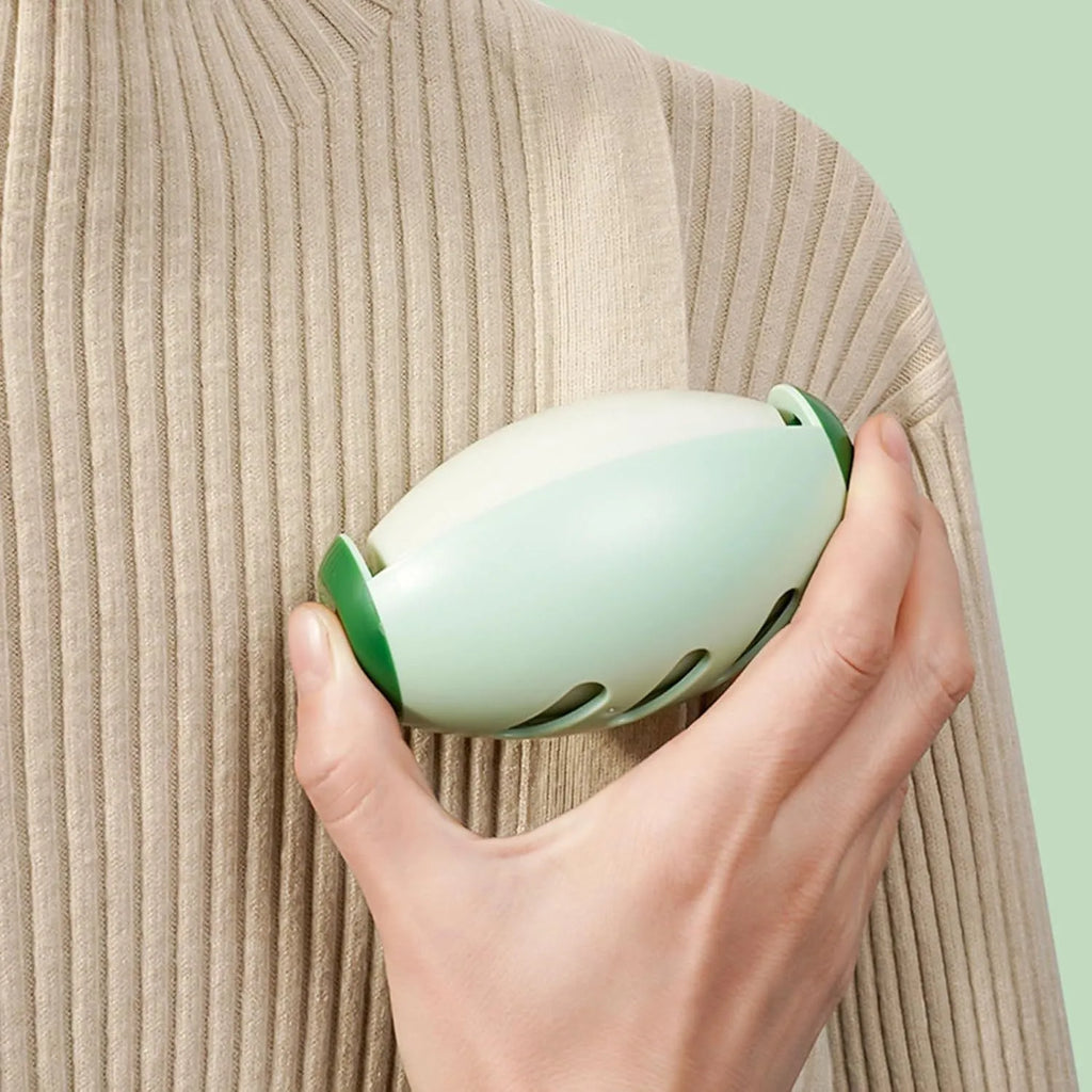 Green and white washable reusable gel lint roller ball for portable pet hair removal
