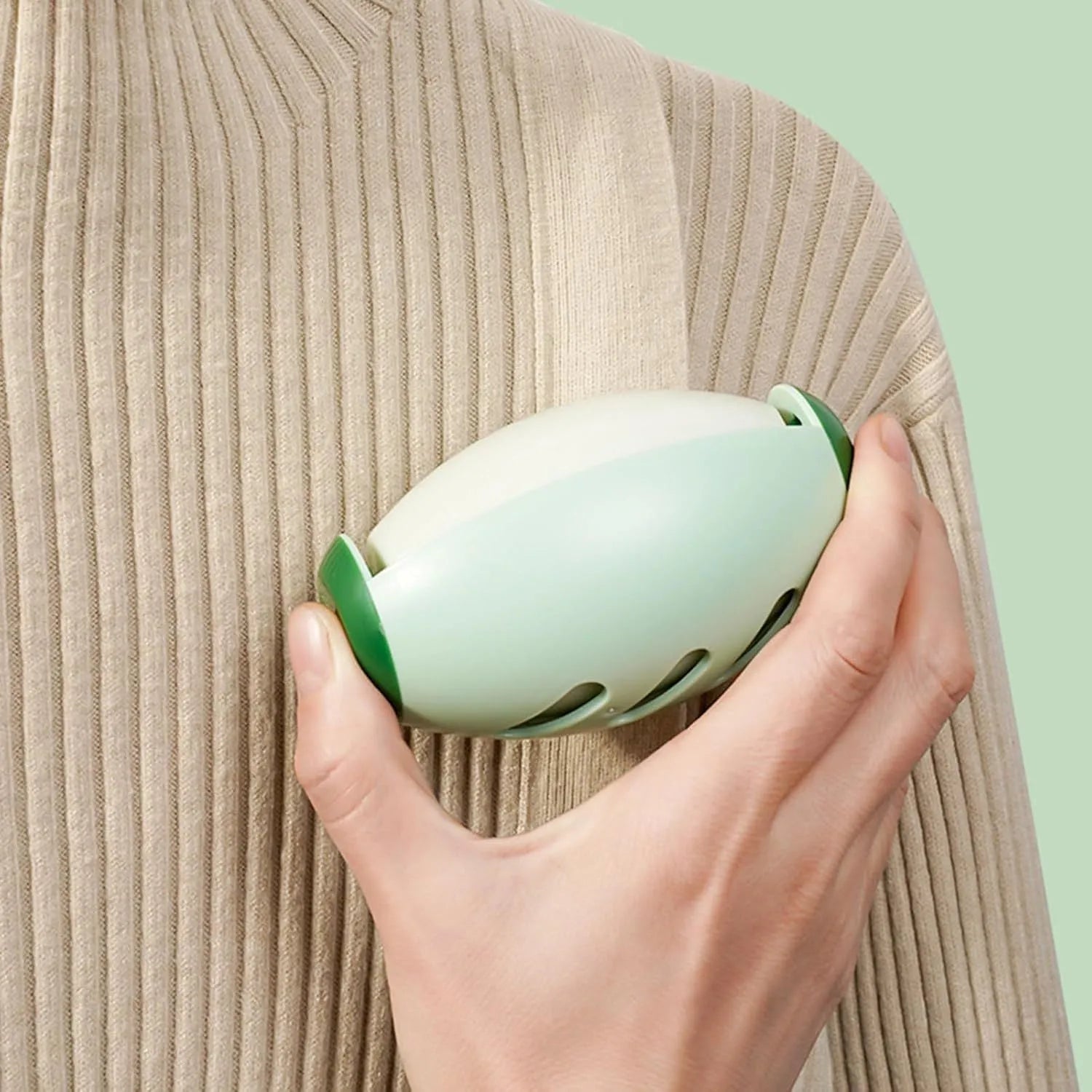Green and white washable reusable gel lint roller ball for portable pet hair removal