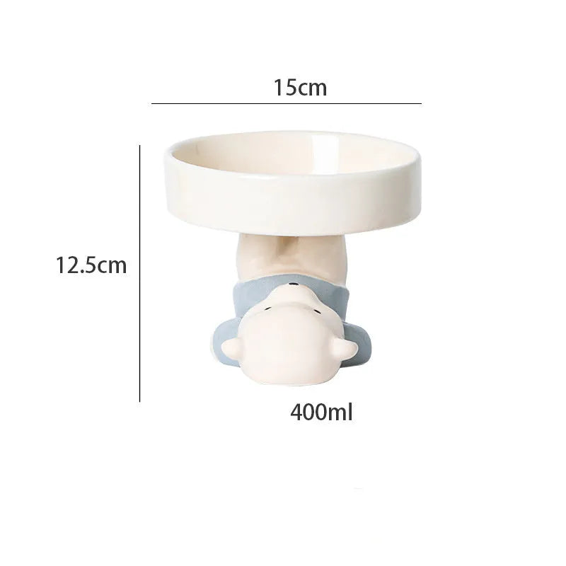 Ceramic elevated cat food bowl with animal theme design in pink, yellow, or white