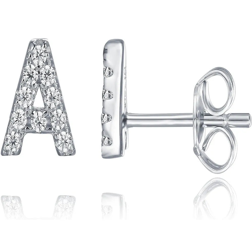 A pair of brass stud earrings featuring a single gold-plated English alphabet letter.