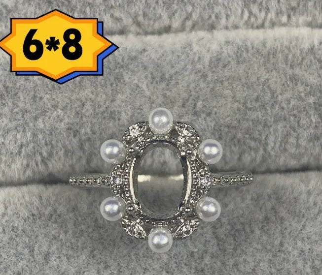 Copper oval denier ring with a 6x8 mm stone and a five-pointed star design.